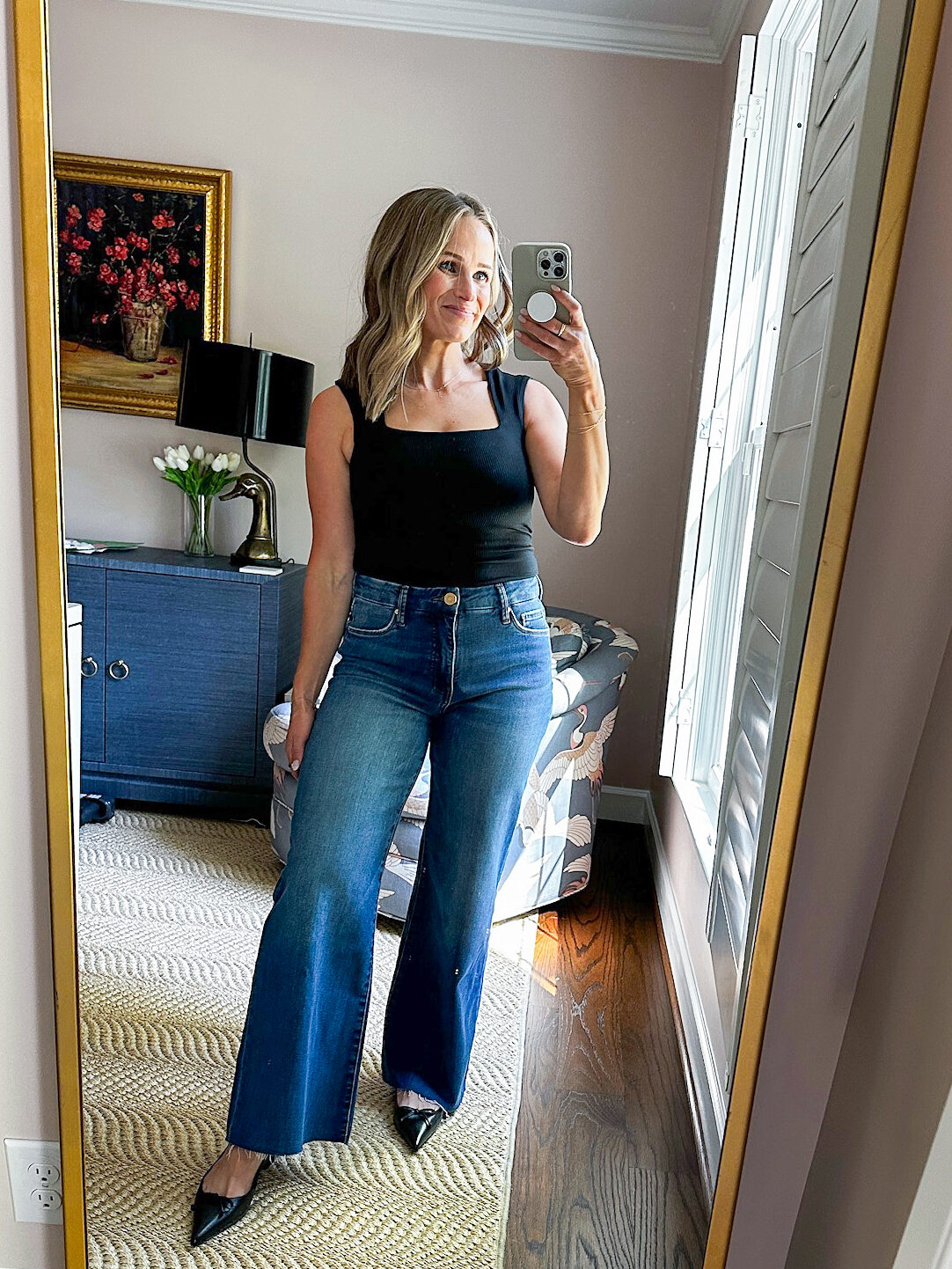 Woman wearing KUT from the Kloth Meg High Waist Raw Hem Ankle Wide Leg Jeans