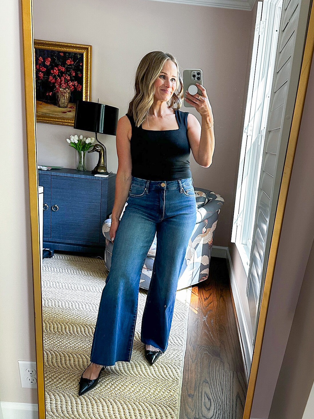 Woman wearing KUT from the Kloth Meg High Waist Raw Hem Ankle Wide Leg Jeans