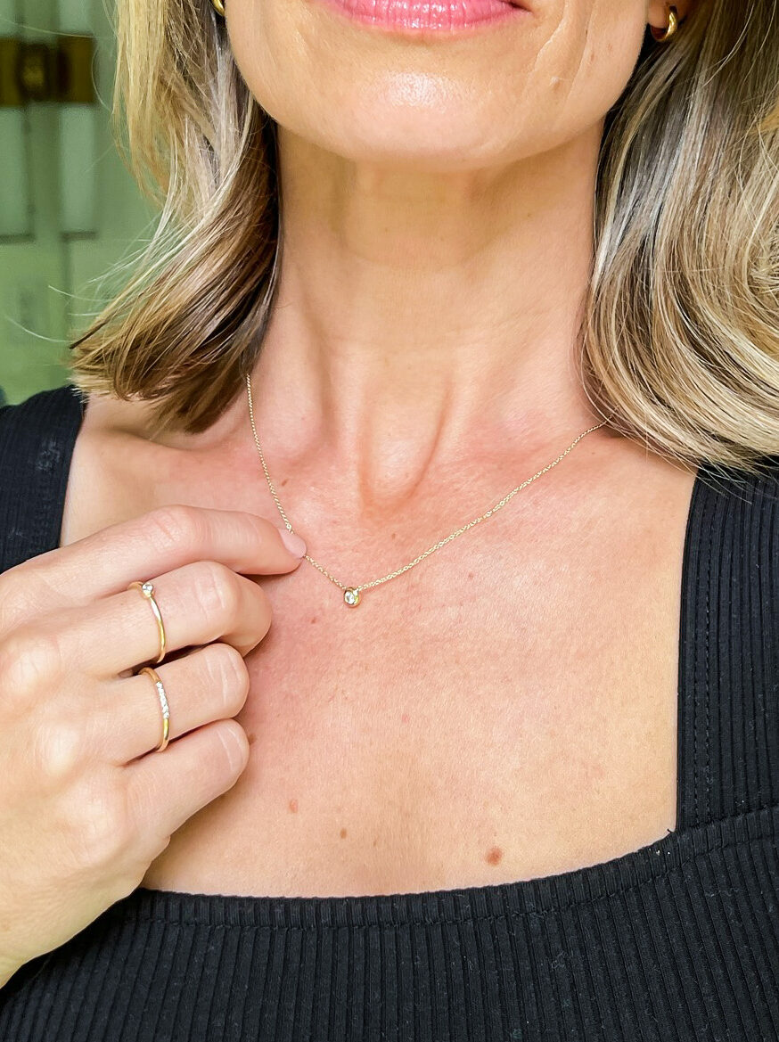 Woman wearing Mejuri Small Diamond Necklace