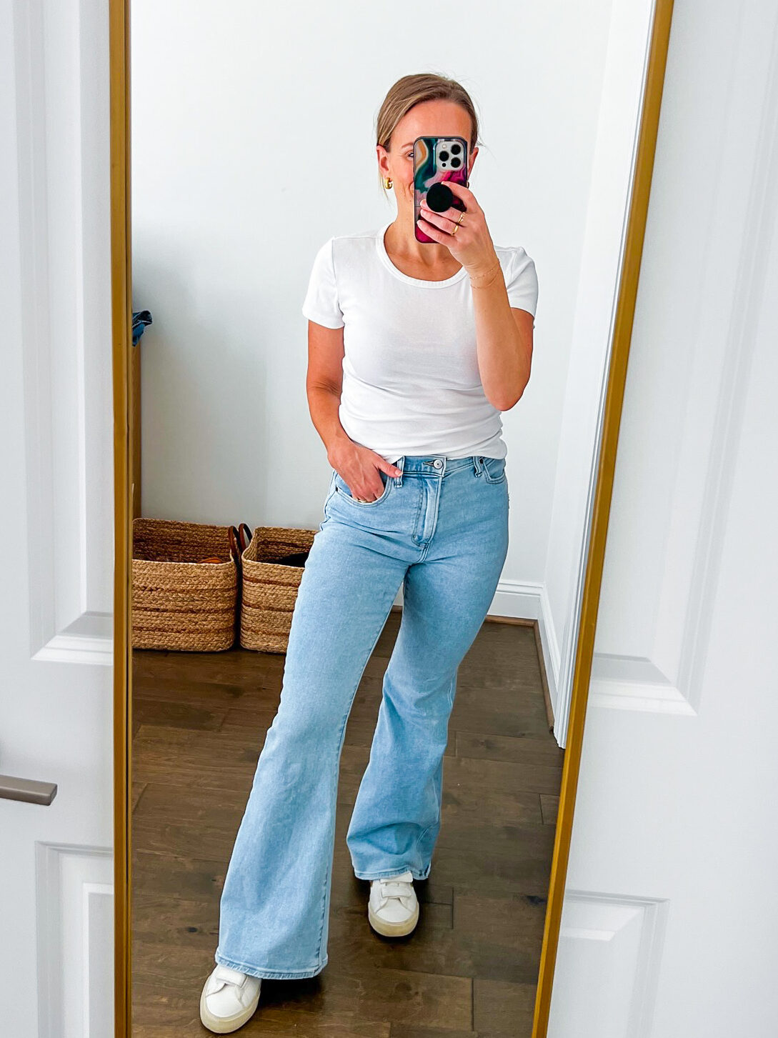 Woman  wearing Ultra High Rise Flare Jean