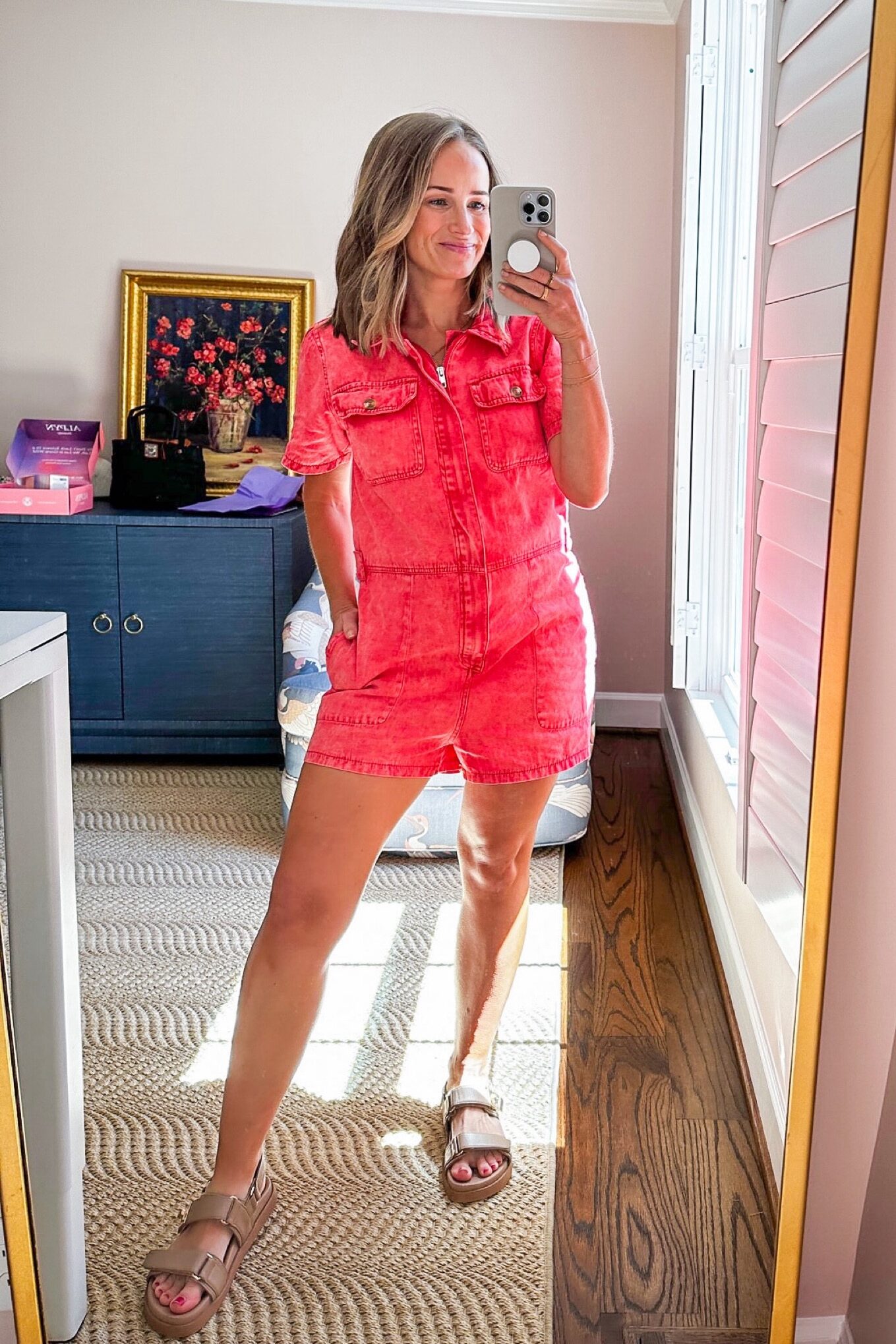 Woman wearing Pink Denim Romper one of her Nursing Friendly Dresses