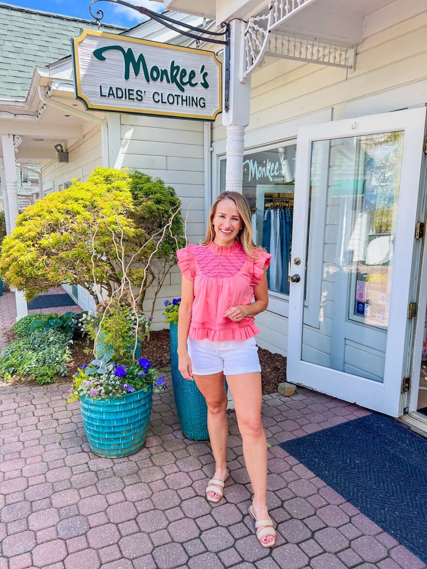 Woman standing outside Shop at Monkee's