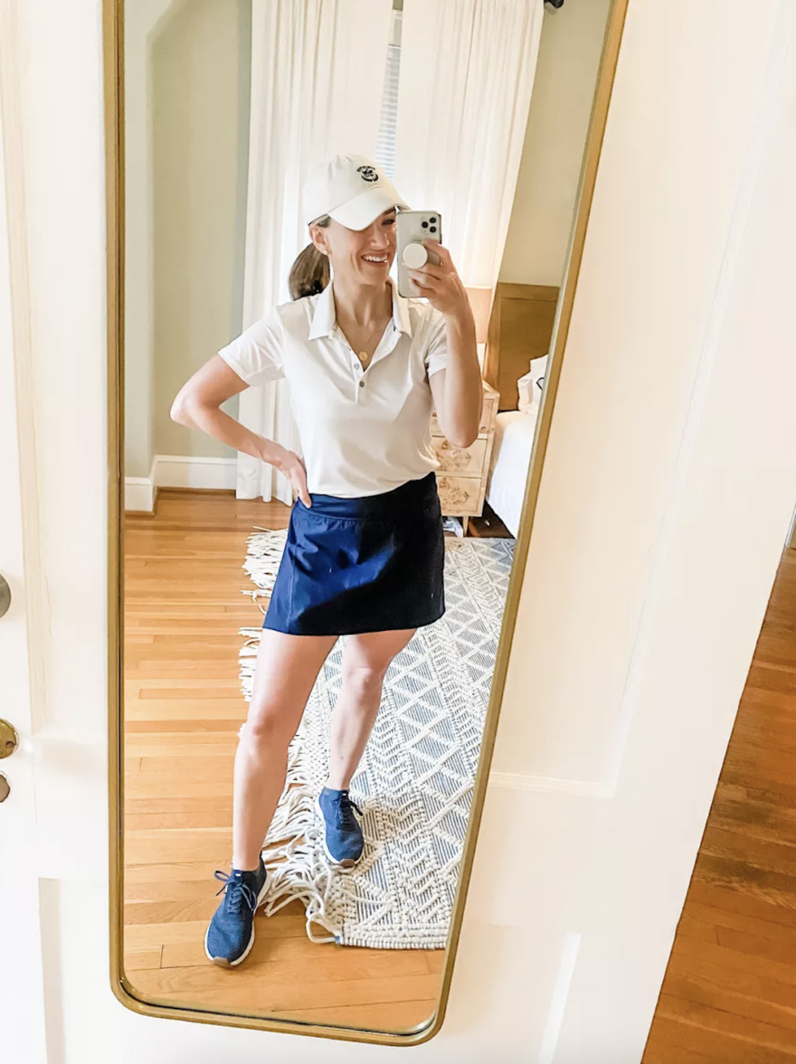 woman wearing SPANX Get Moving Skort in blue