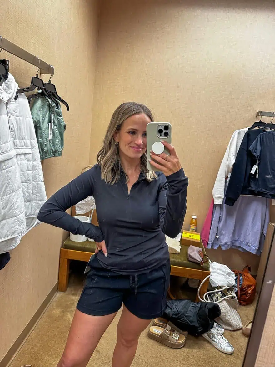 Woman wearing Zella Luxe Lite Half Zip Performance Top