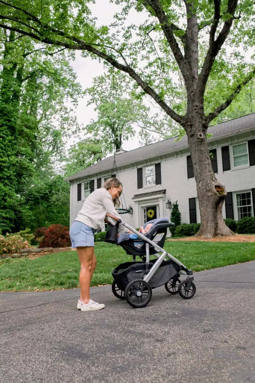 Woman using Uppababy Vista stroller