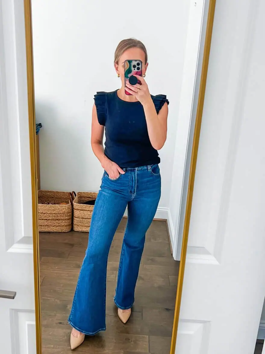 Woman taking selfie in Abercrombie Ultra High Rise Stretch Flare Jean