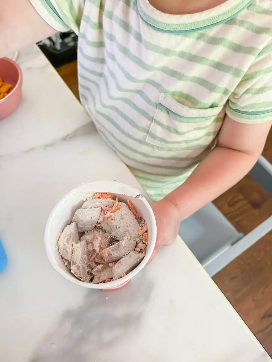 Toddler eating a Daily Harvest Smoothie