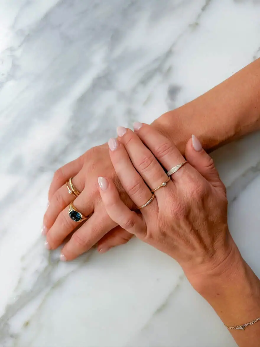 Woman wearing Mejuri rings